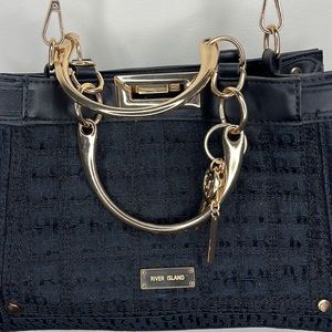Black River Island crossbody bag, with gold hardware.